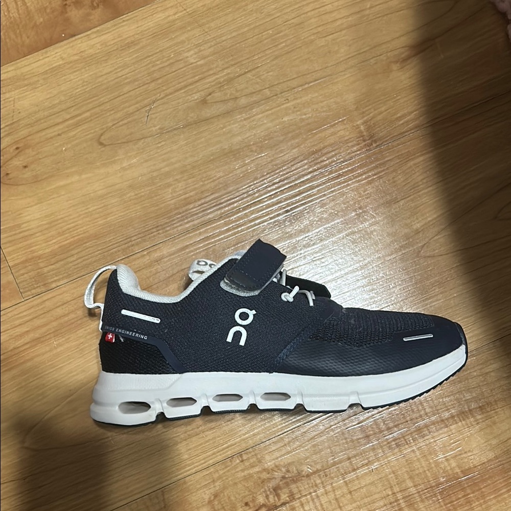 On Running Blue and White Sneakers with Cloud Cushioning